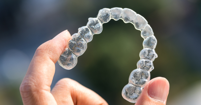 Can I brush and floss normally with Invisalign aligners?